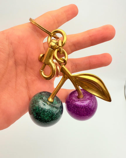 Purple & Green Glitter Cherry Keychain – Dual-Color Resin Fruit Charm with Gold Stem | Cute Statement Bag Accessory